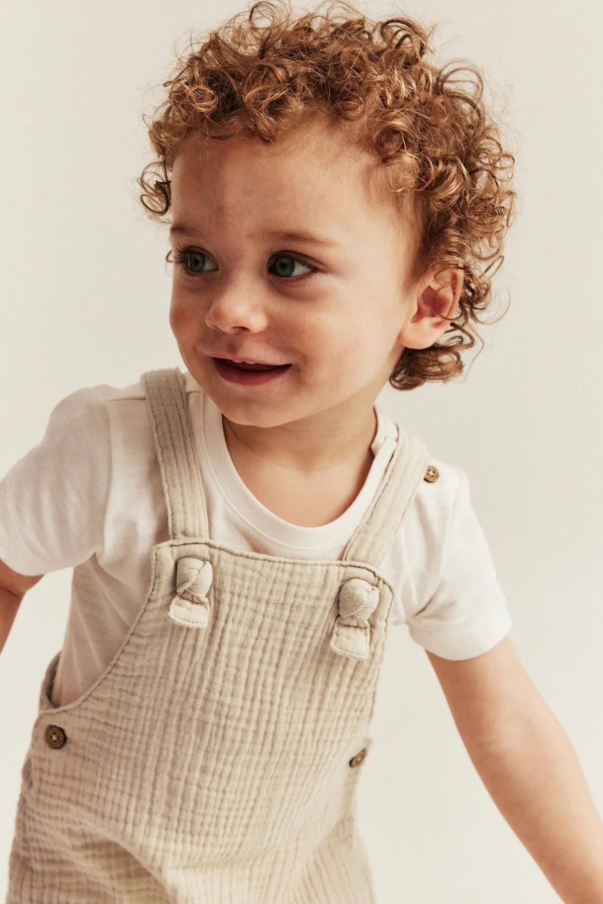 Baby beige dungaree shorts