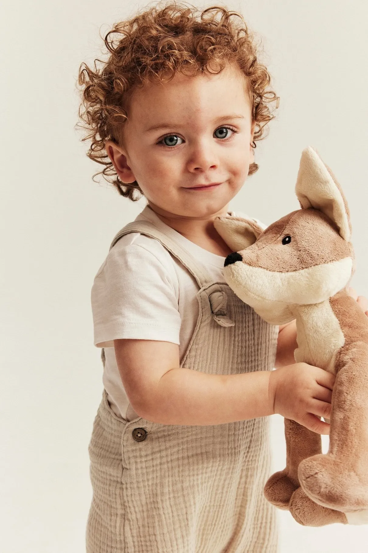 Baby beige dungaree shorts