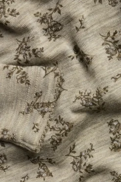 Baby beige floral merino wool bodysuit