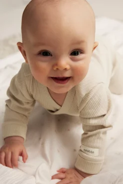 Baby beige ribbed bodysuit with extender