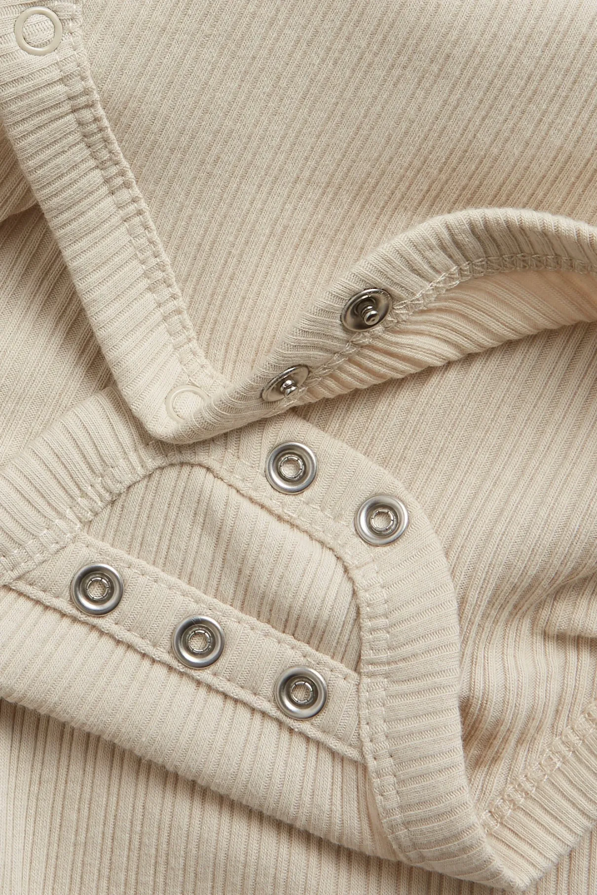 Baby beige ribbed bodysuit with extender