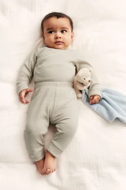 Baby beige ribbed bodysuit with extender