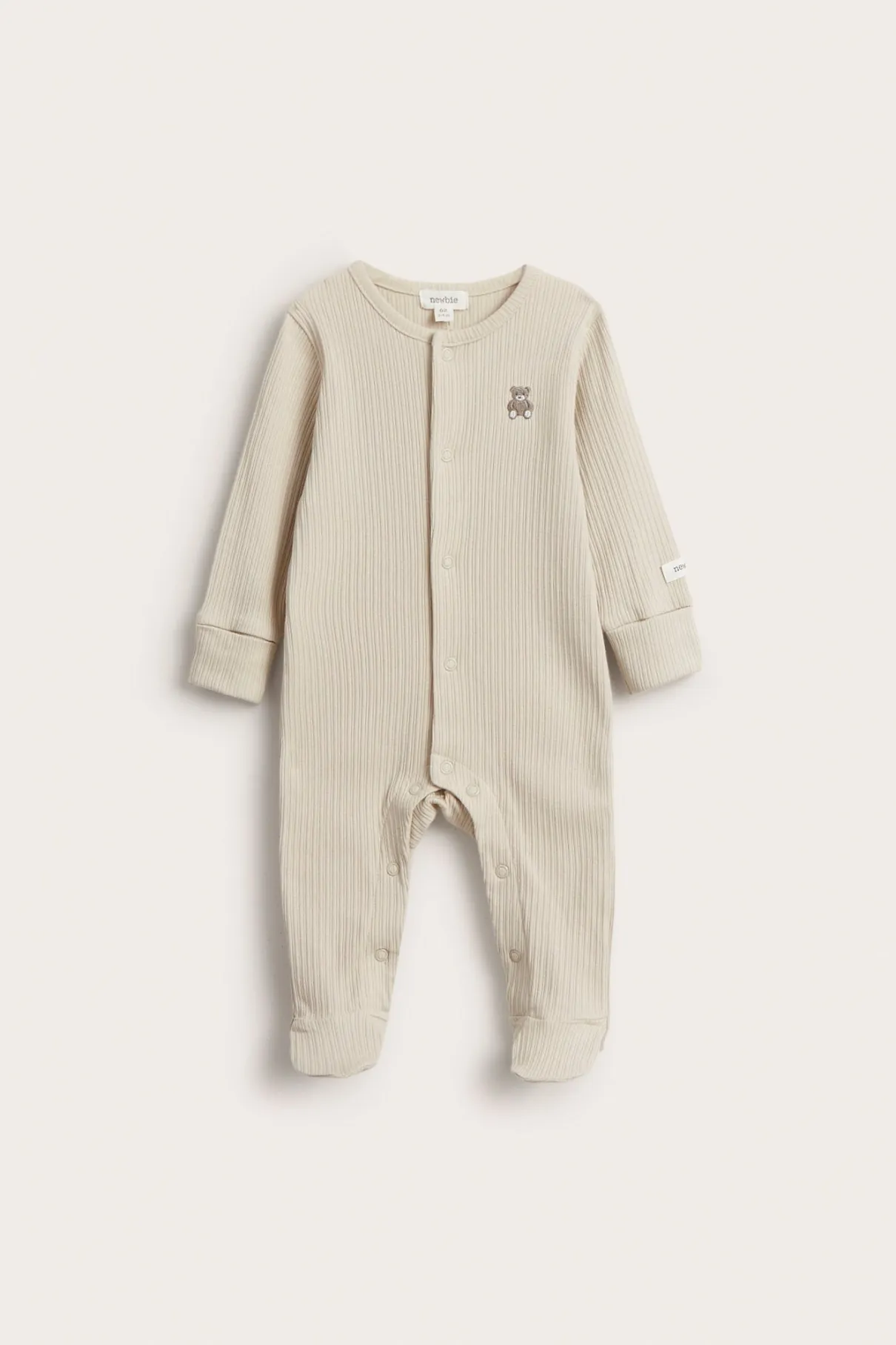 Baby beige ribbed sleepsuit