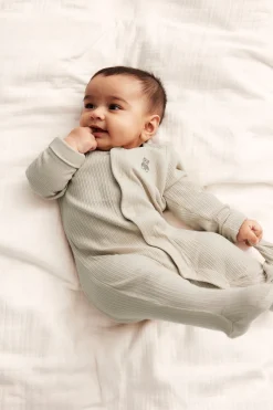 Baby beige ribbed sleepsuit