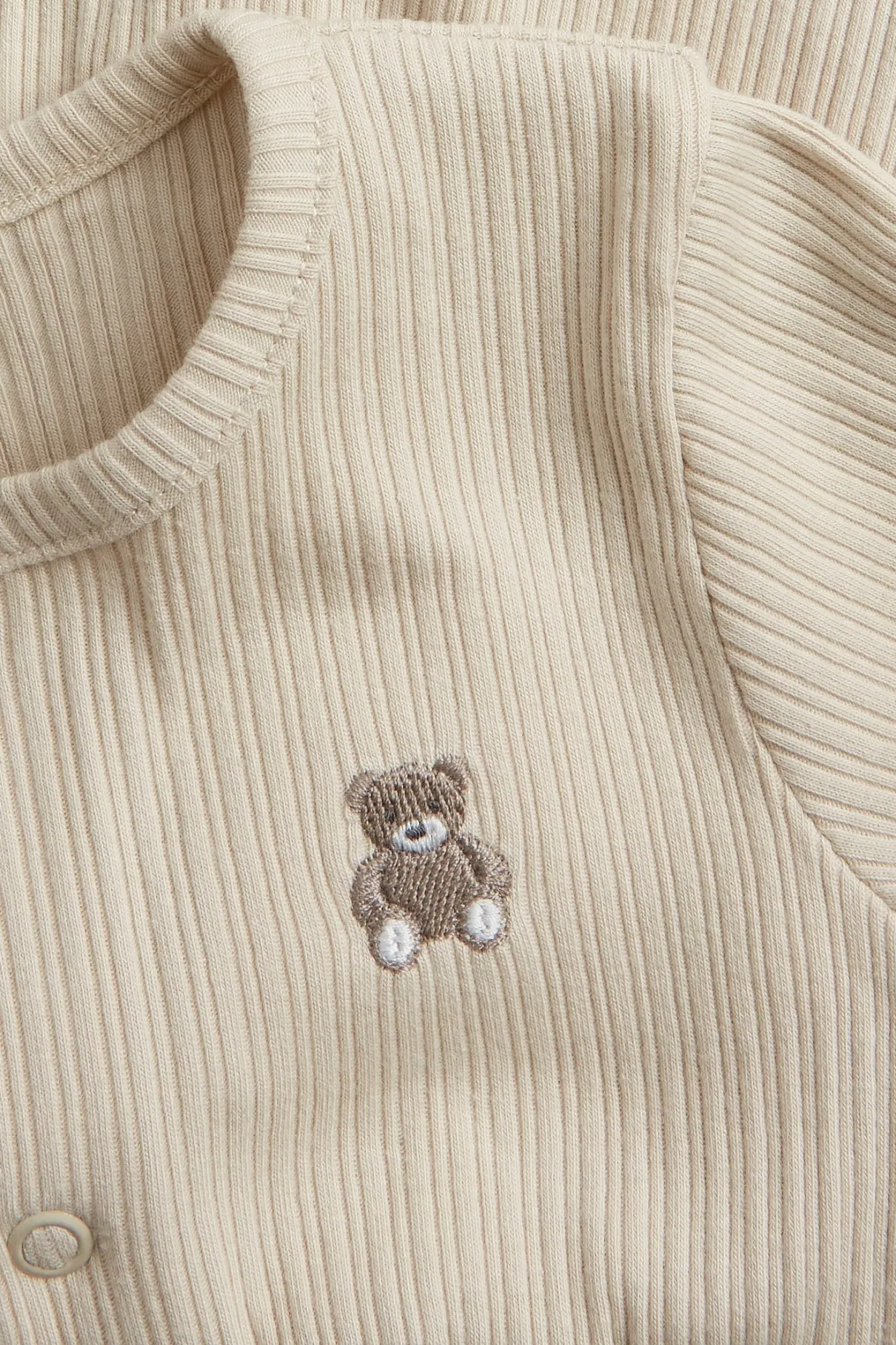 Baby beige ribbed sleepsuit