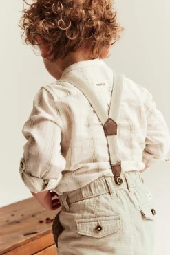 Baby beige woven trousers with suspenders