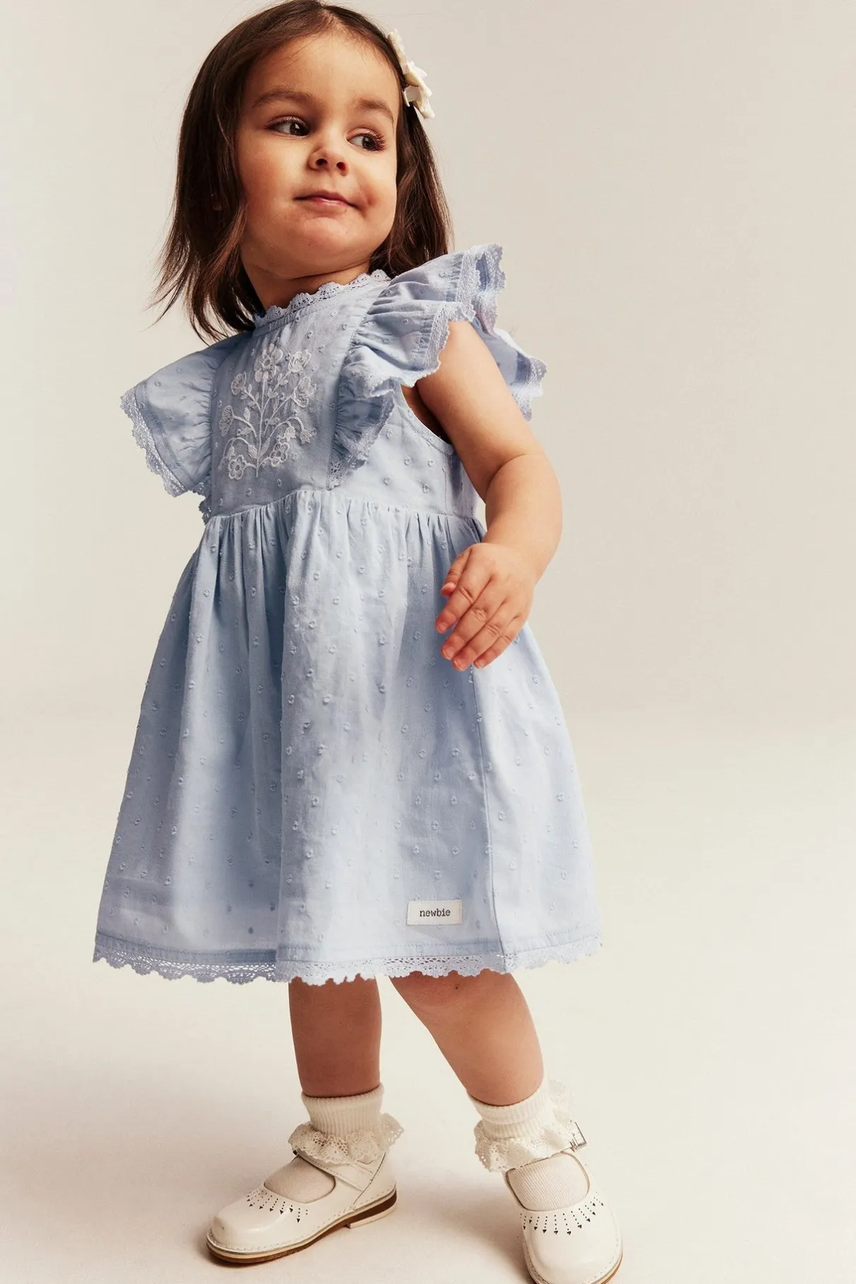 Baby blue dress with floral embroidery