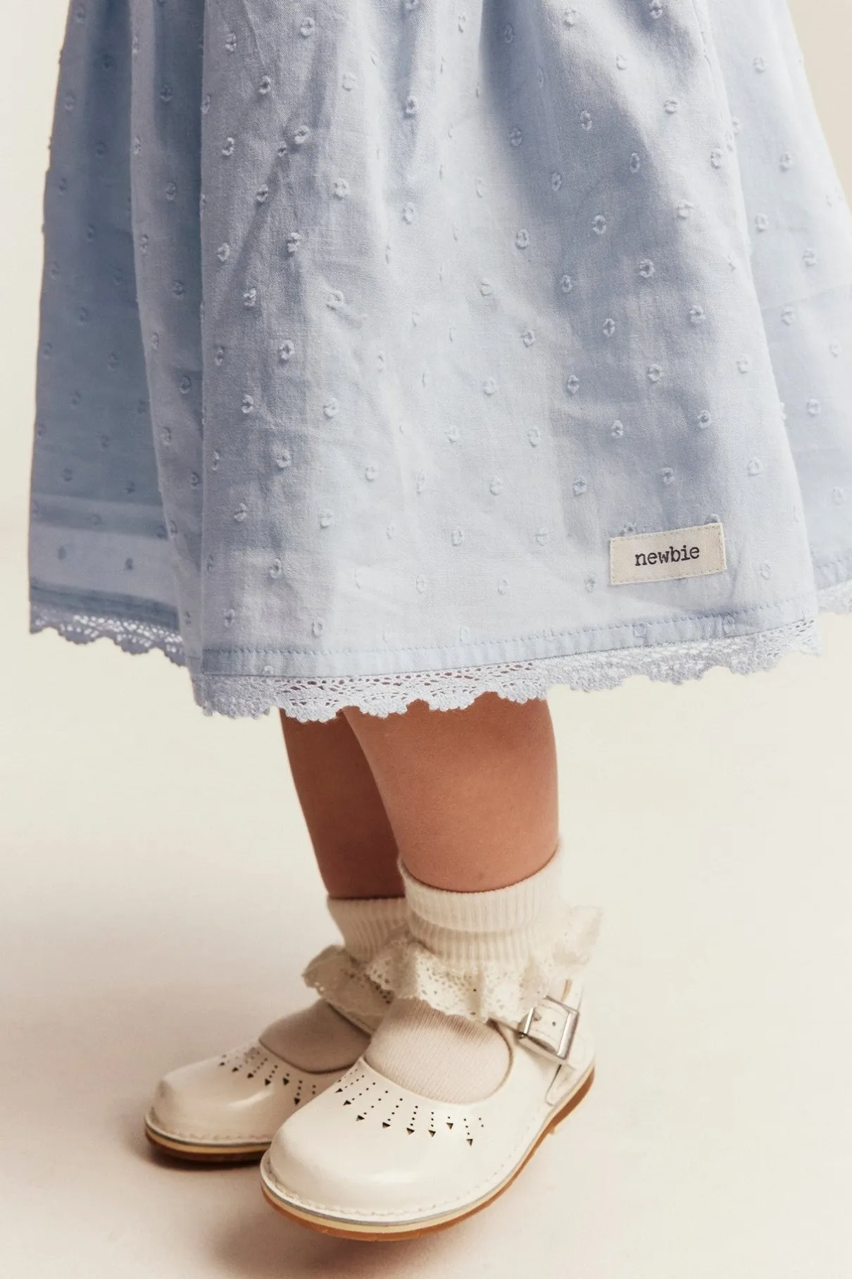 Baby blue dress with floral embroidery