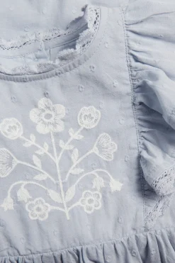 Baby blue dress with floral embroidery