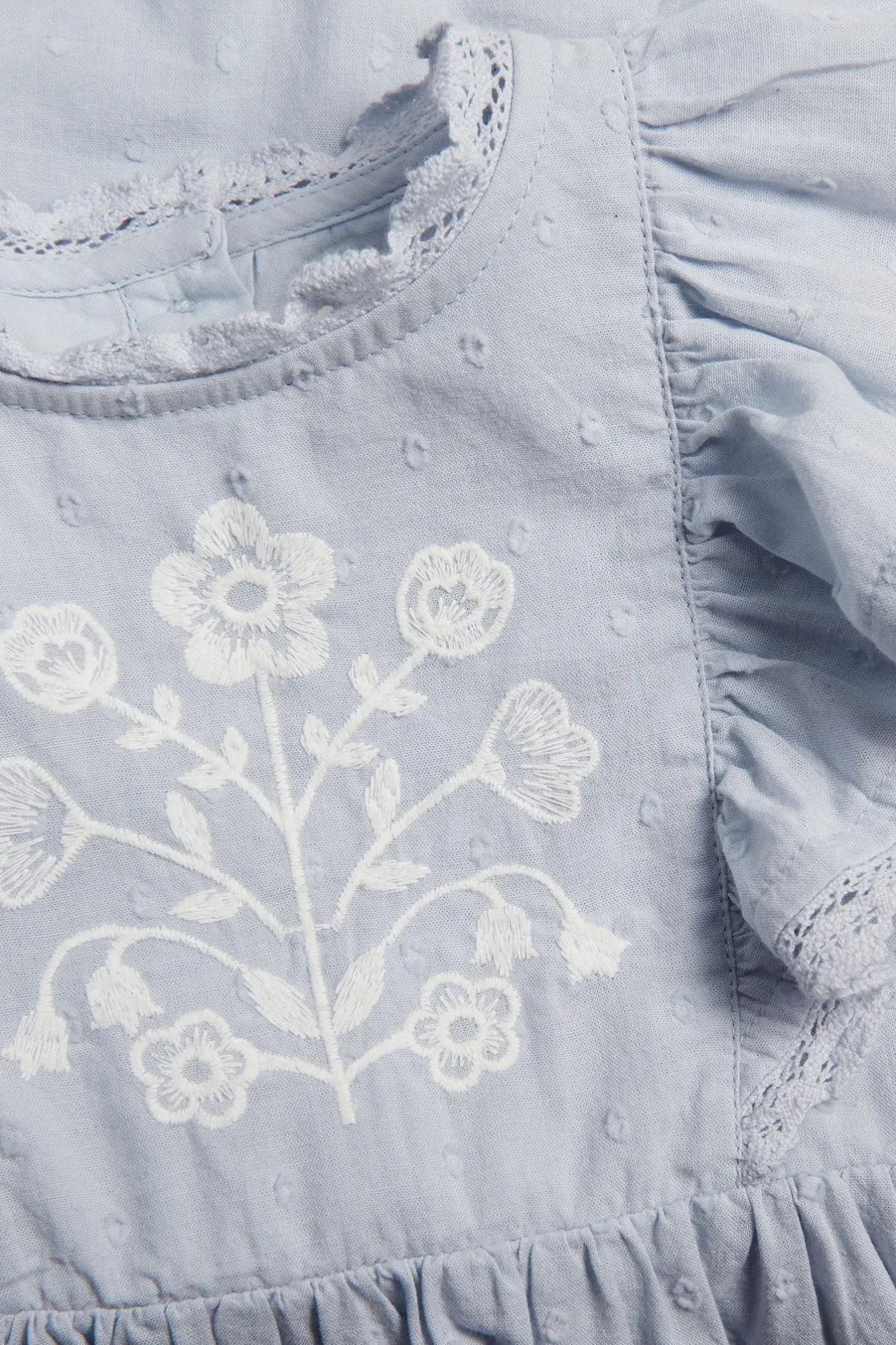 Baby blue dress with floral embroidery