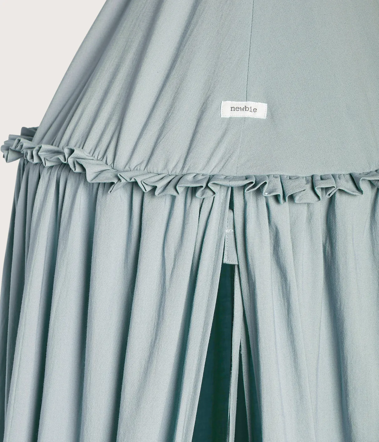 Baby blue play tent with pom-poms