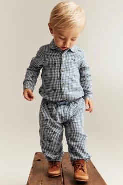 Baby blue shirt bodysuit with blueberries