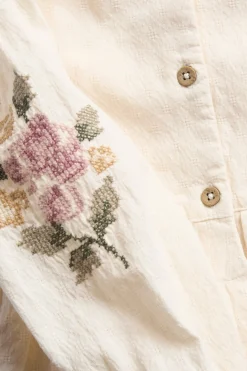 Baby bodysuit with floral embroidery
