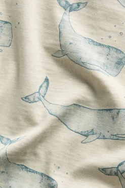 Baby bodysuit with whale print