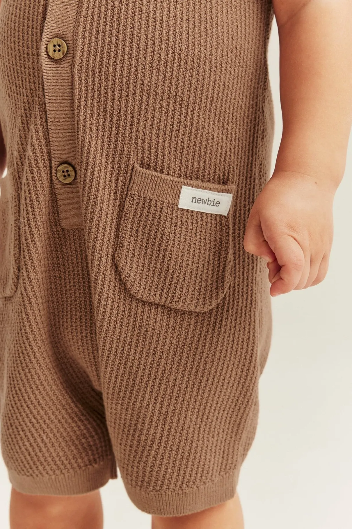 Baby brown fine-knit romper