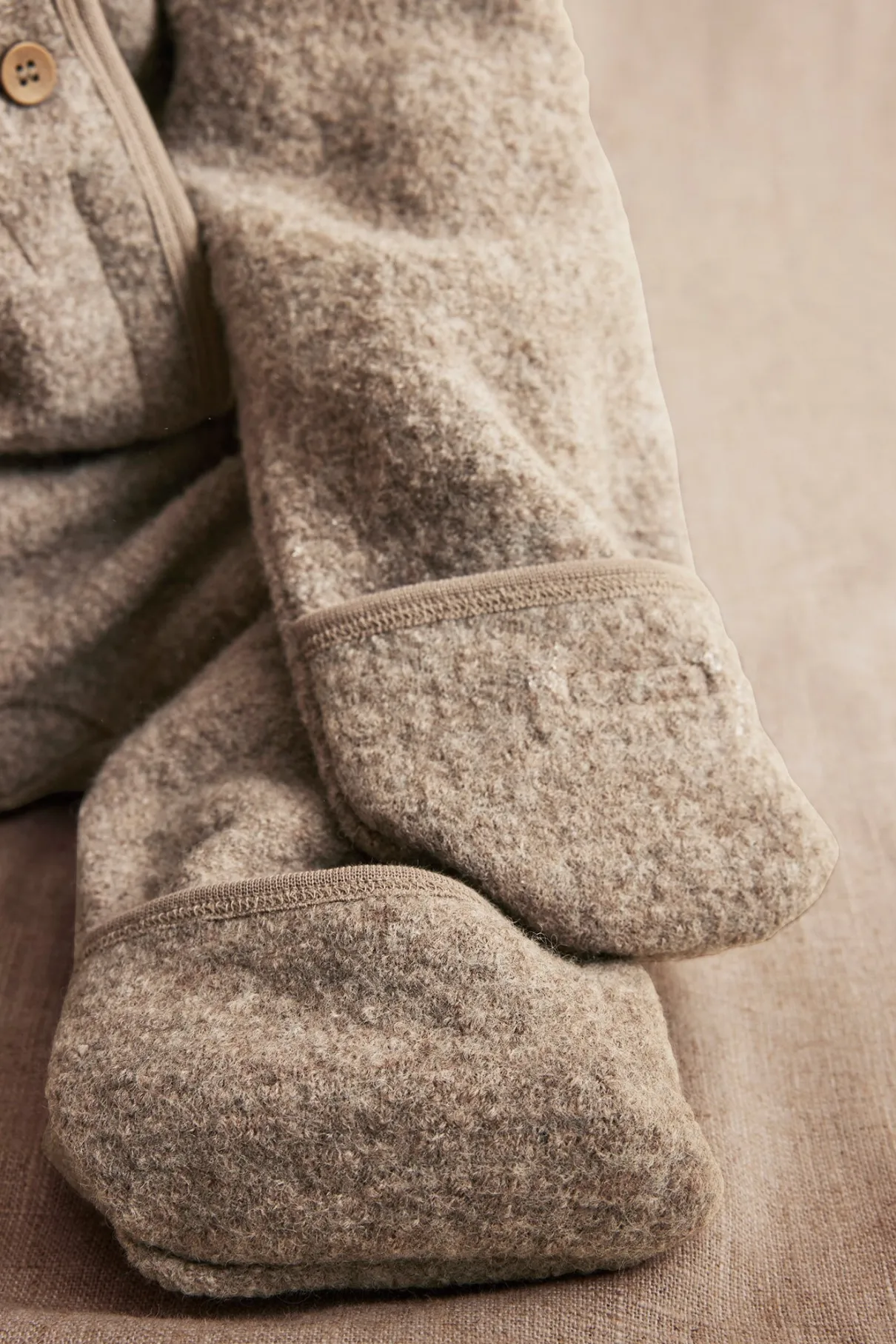 Baby brown wool coverall with hood ears