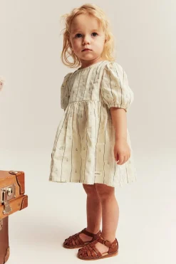 Baby cream striped dress with sailboats