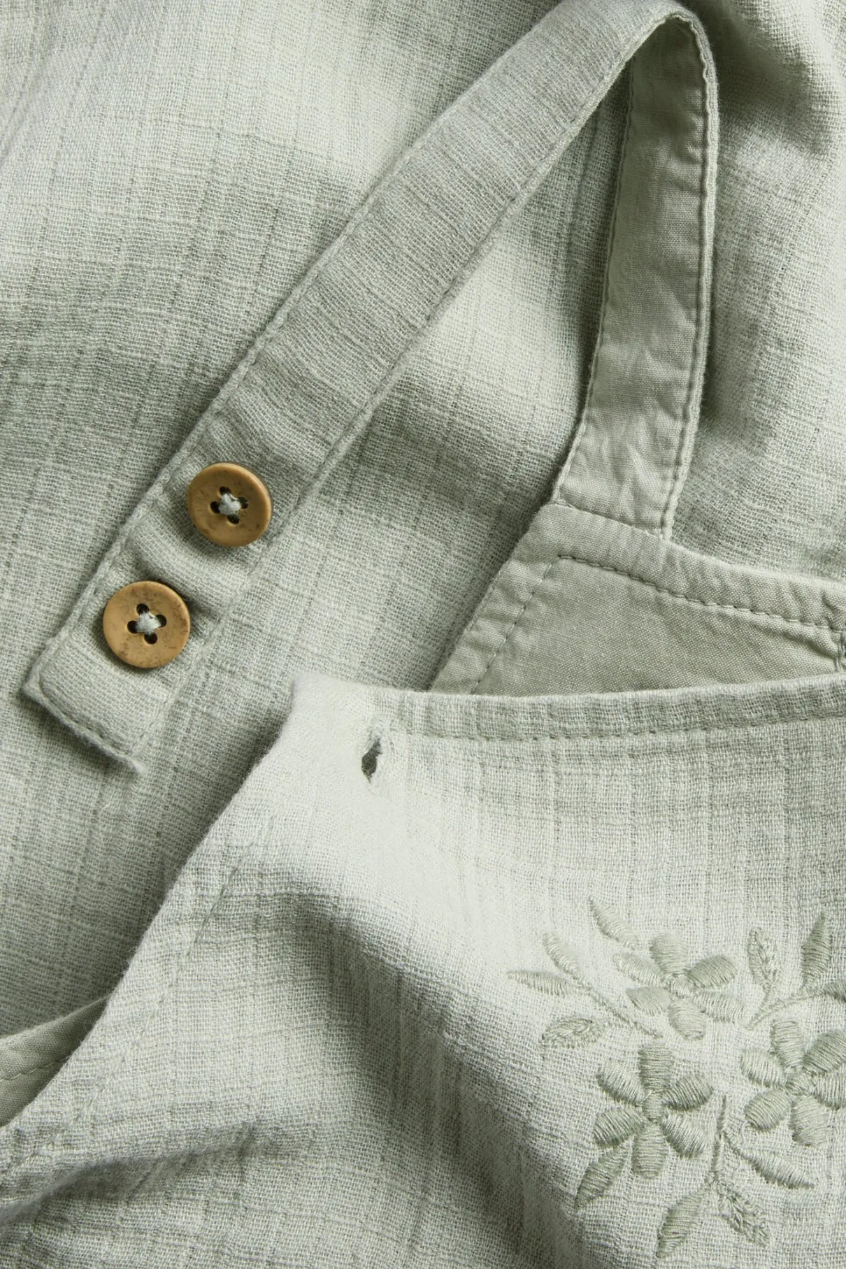 Baby dungarees with lace frill