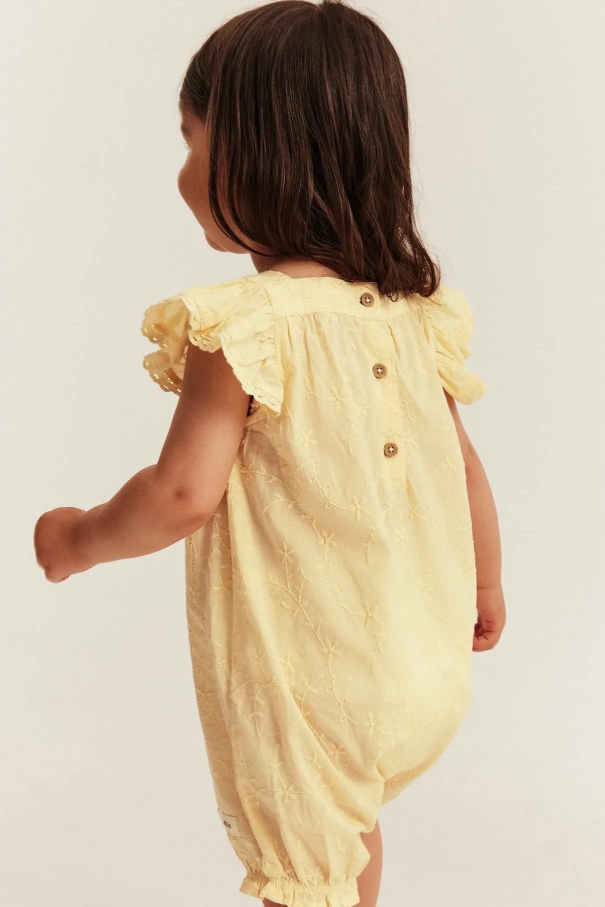 Baby embroidered woven romper
