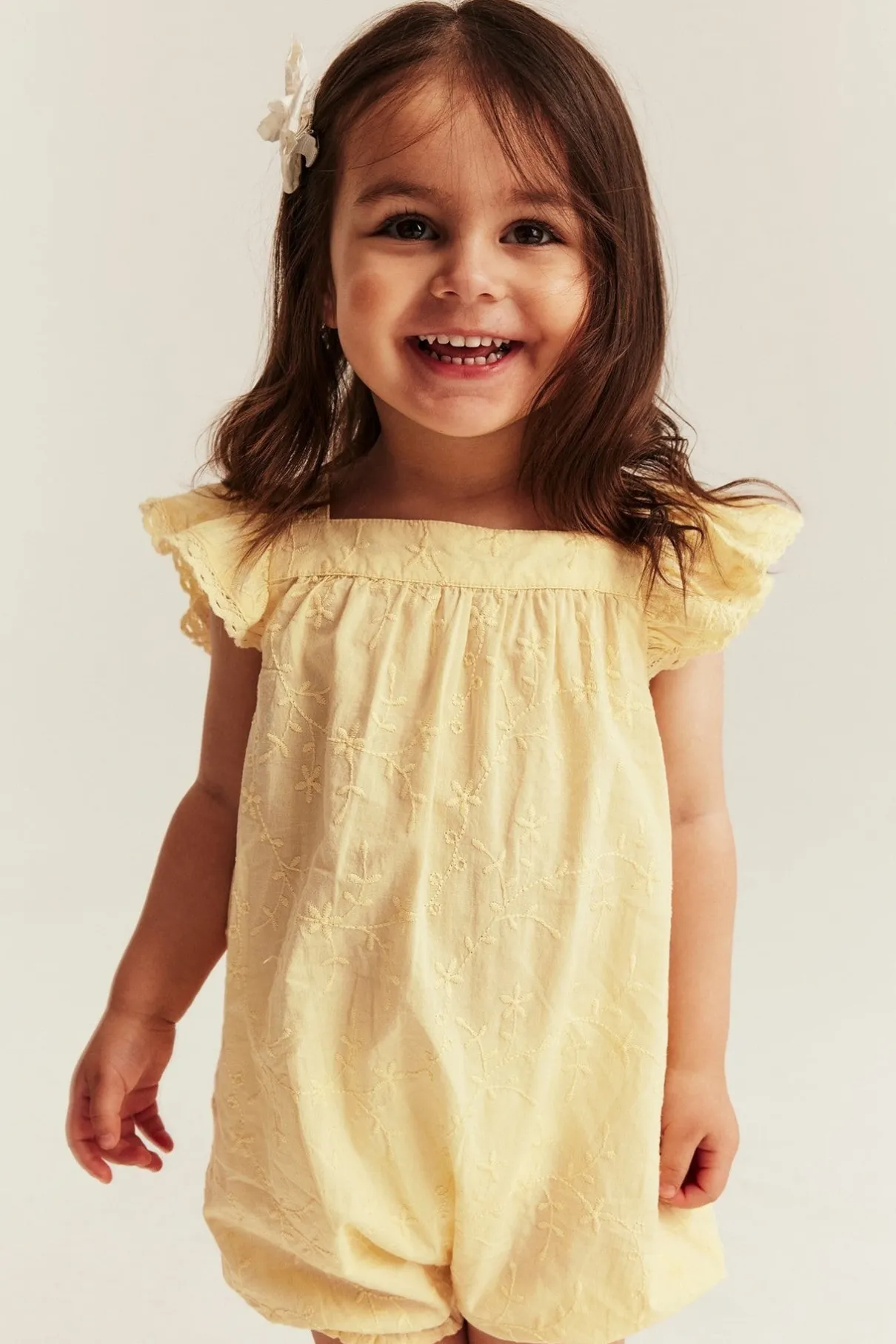 Baby embroidered woven romper