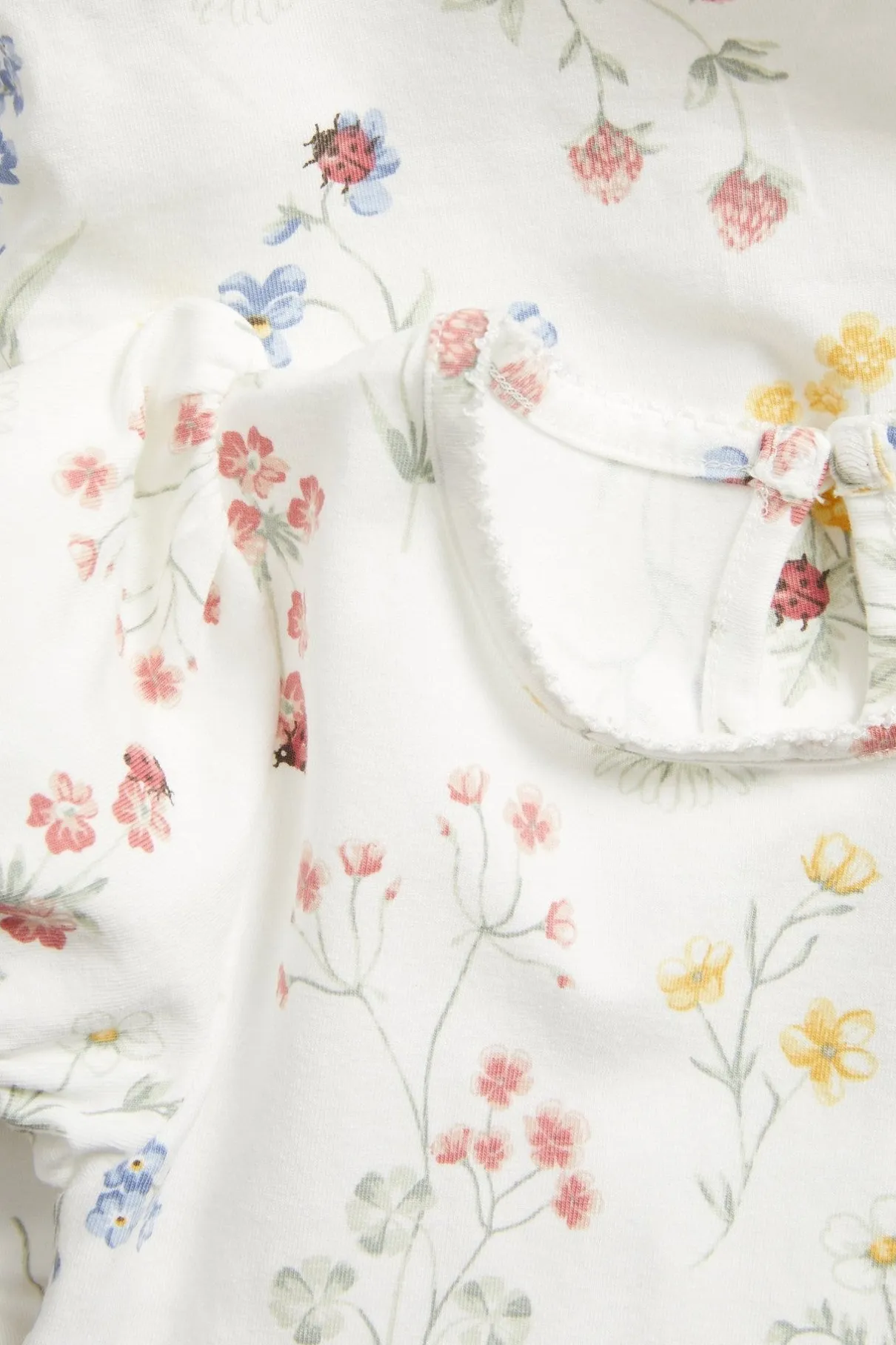 Baby floral body with puff sleeves