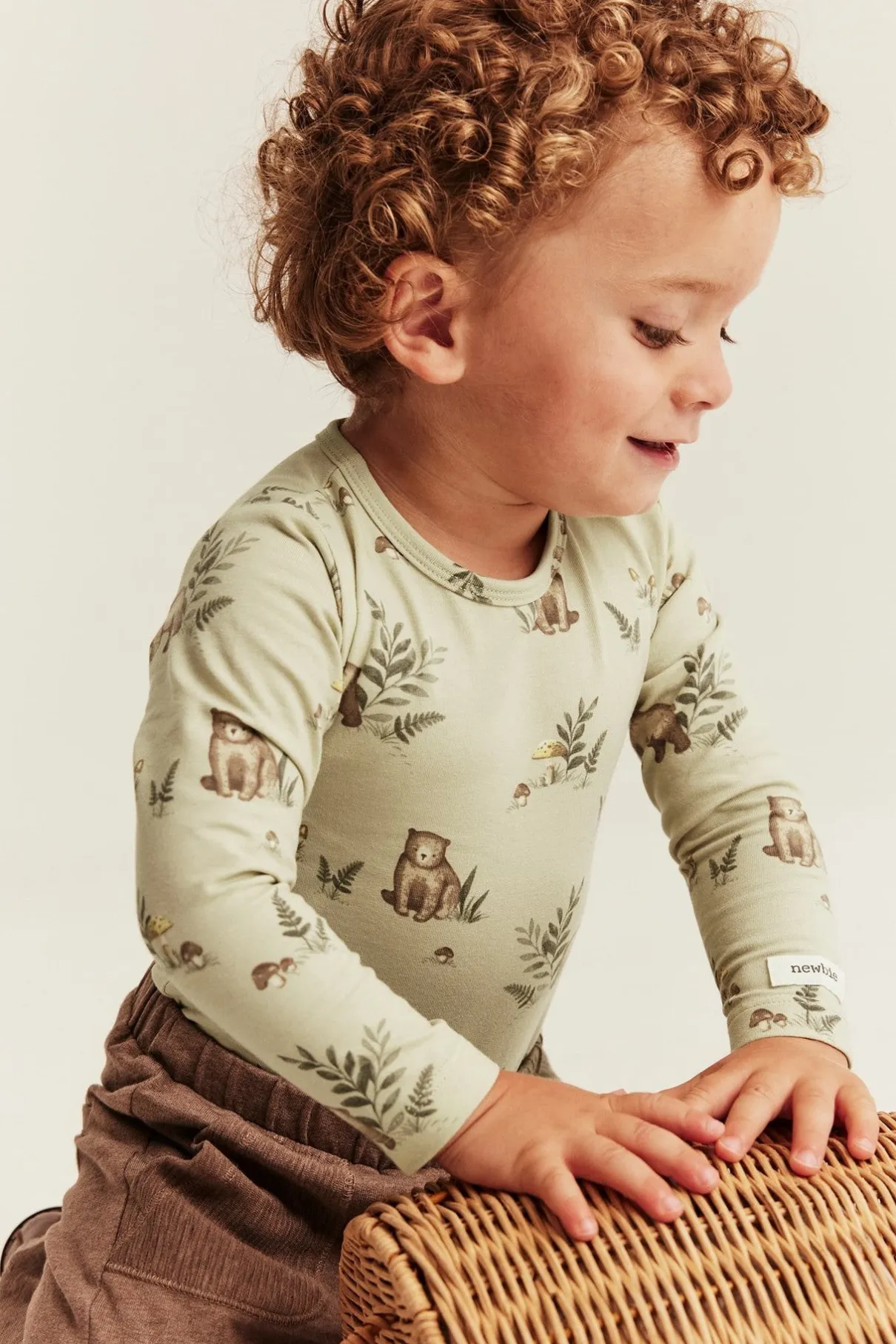 Baby green bodysuit with bear print