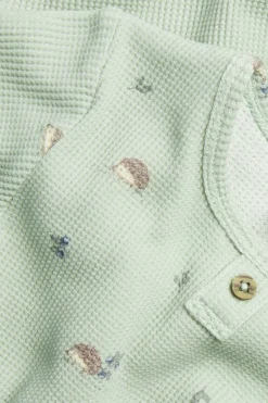 Baby green hedgehog-patterned bodysuit