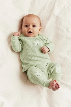 Baby green knitted cardigan with rabbit appliqué
