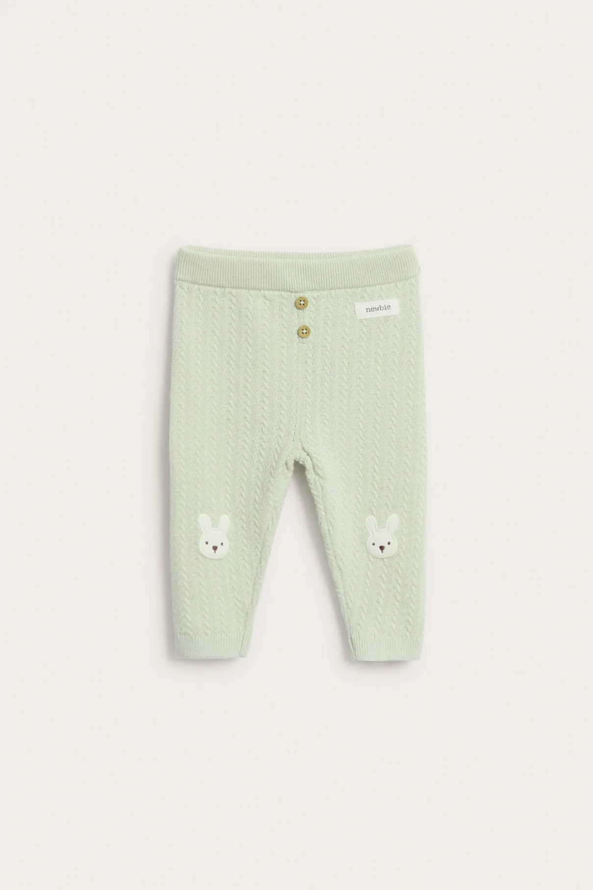 Baby green knitted leggings with rabbit appliqué