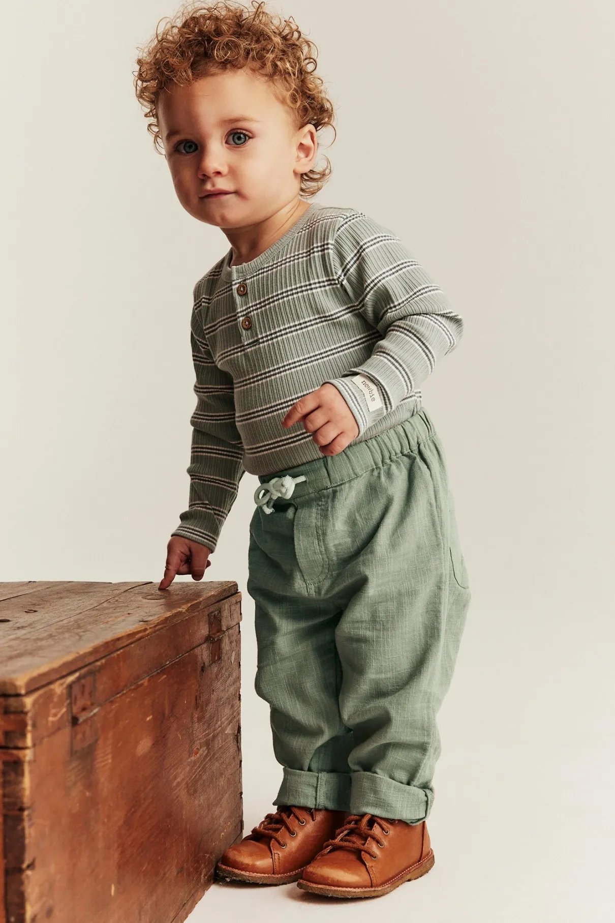 Baby green textured woven trousers