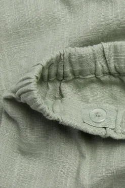 Baby green textured woven trousers