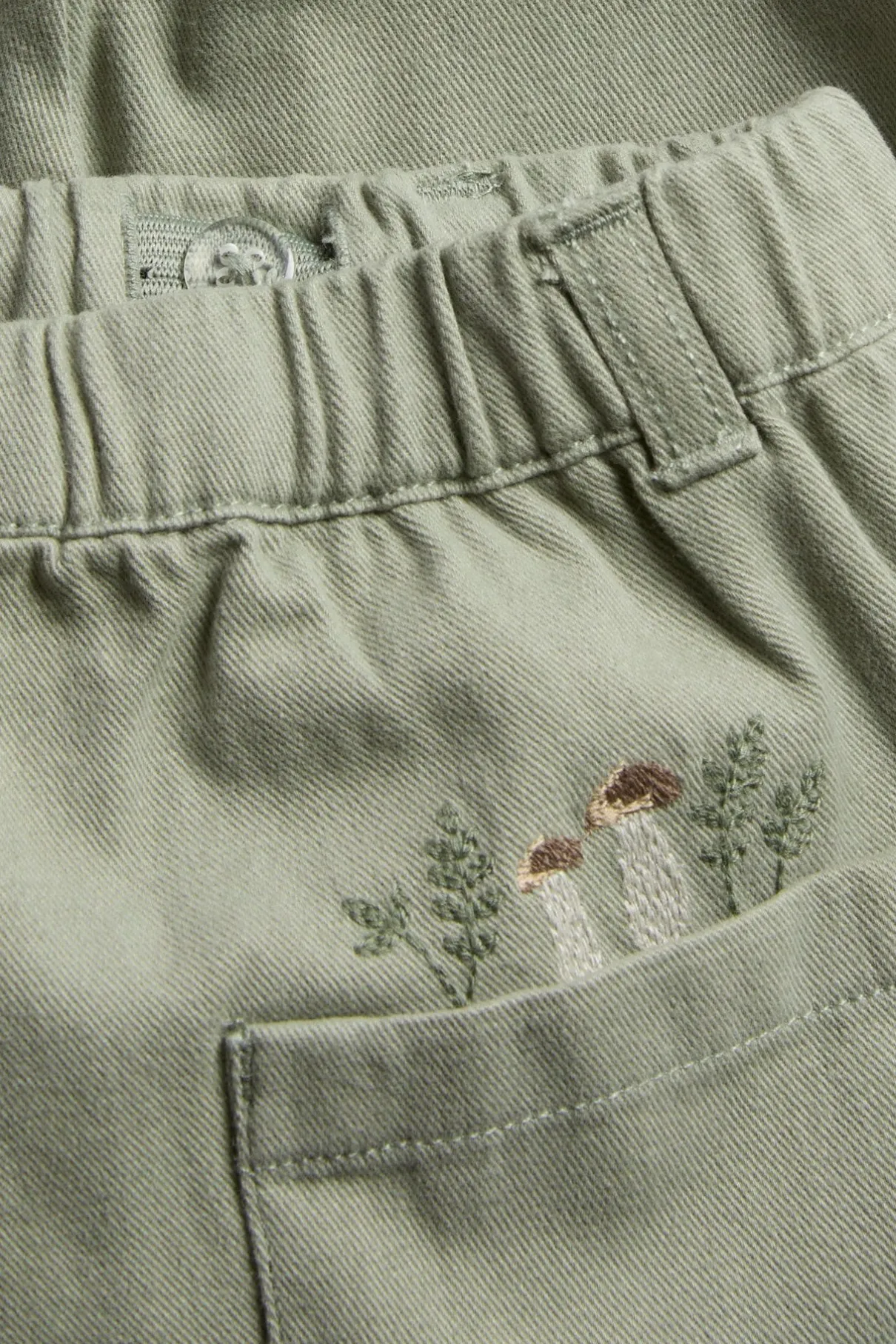 Baby green trousers with embroidery