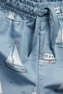 Baby & Kids’ blue swimming trunks with boat pattern