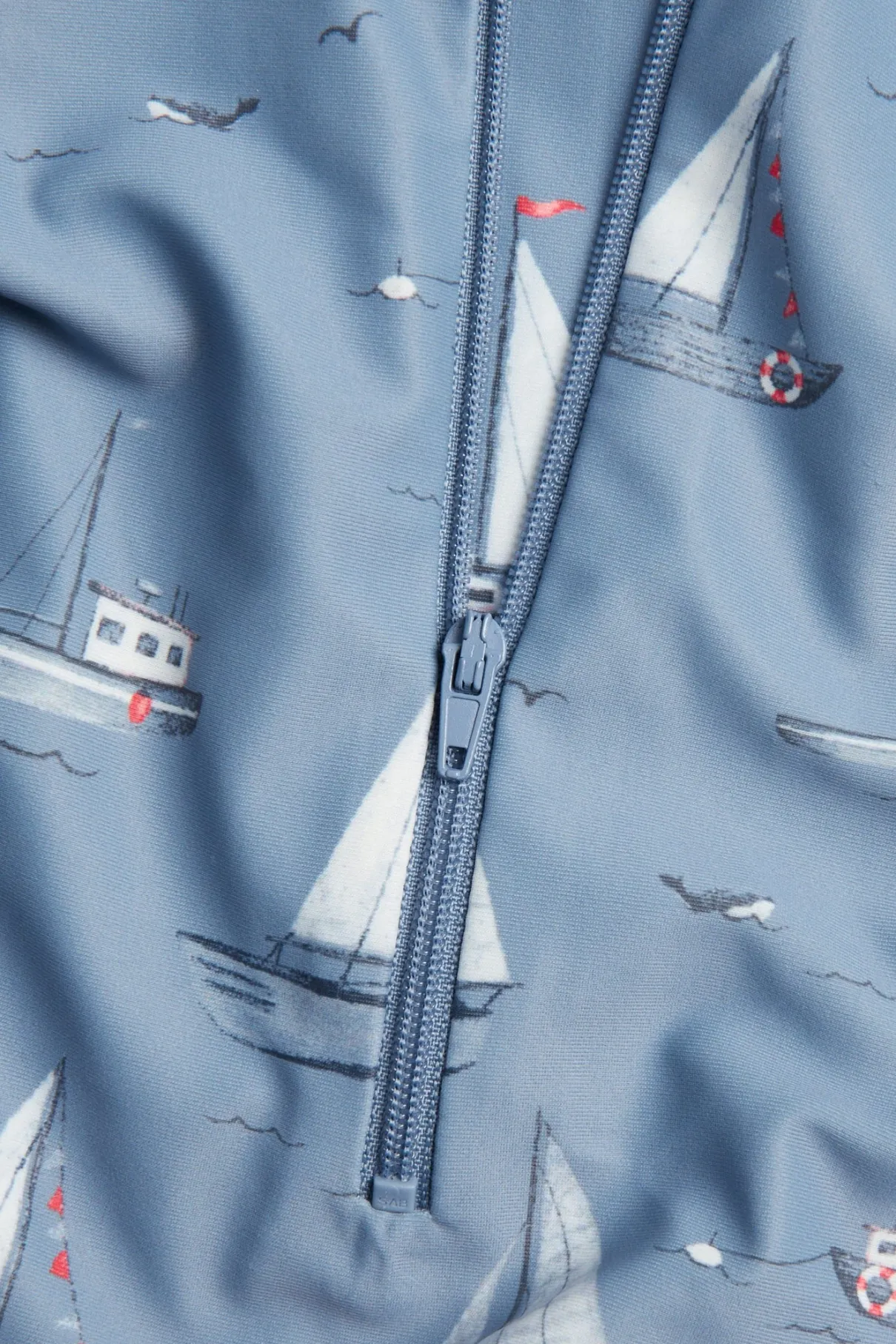 Baby & kids' blue UV suit with boat pattern