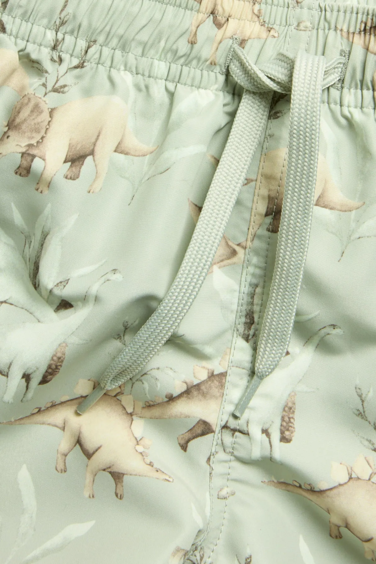 Baby & kids green swimming trunks with dinosaurs