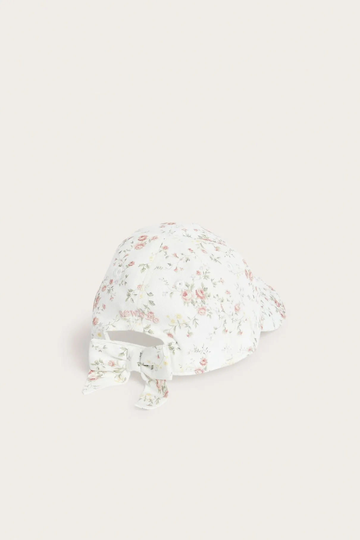 Baby & kids’ white floral cap with bow