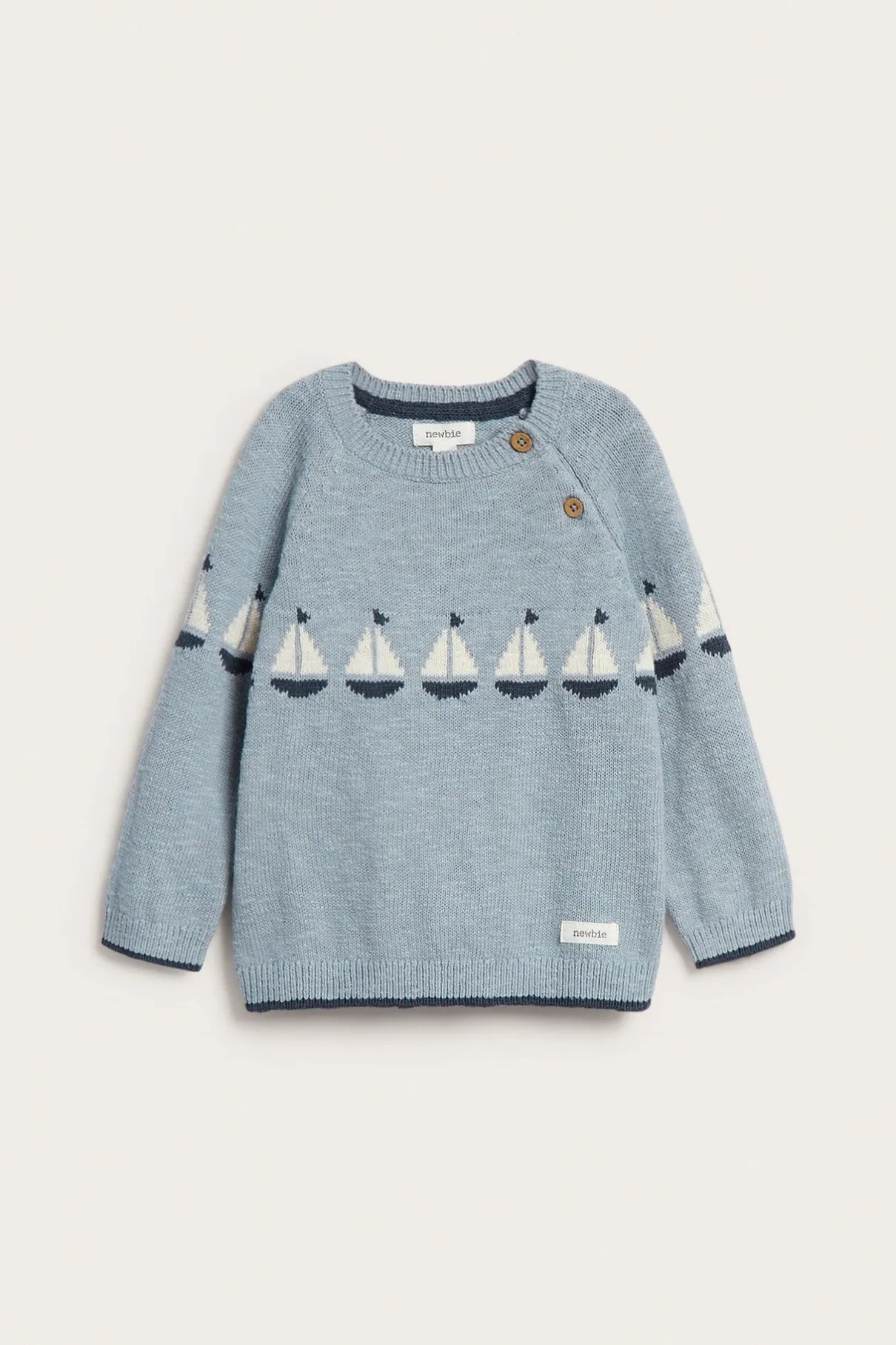 Baby knitted sweater with sailboats