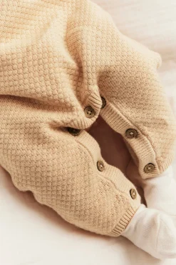 Baby orange knitted jumpsuit with embroidered rabbit