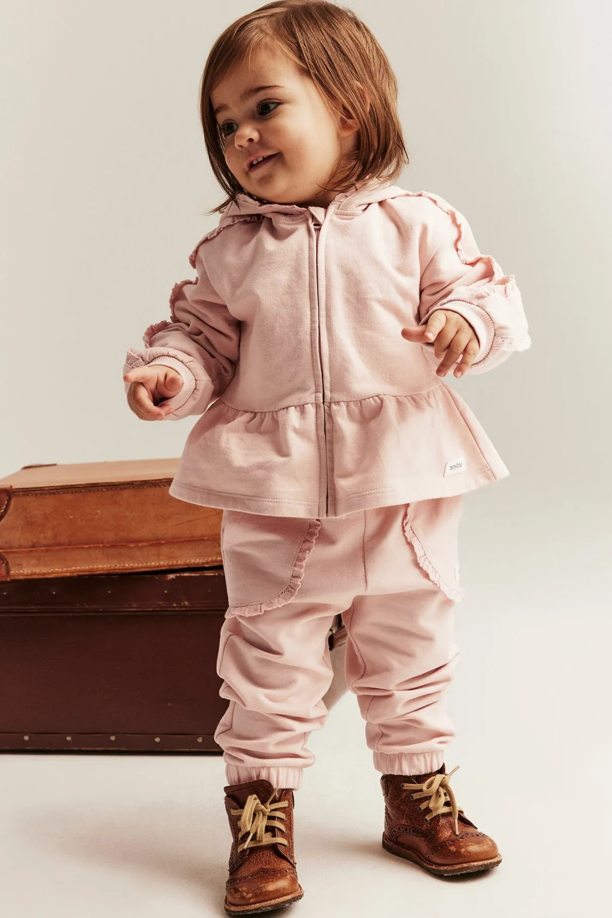 Baby pink joggers with lace details