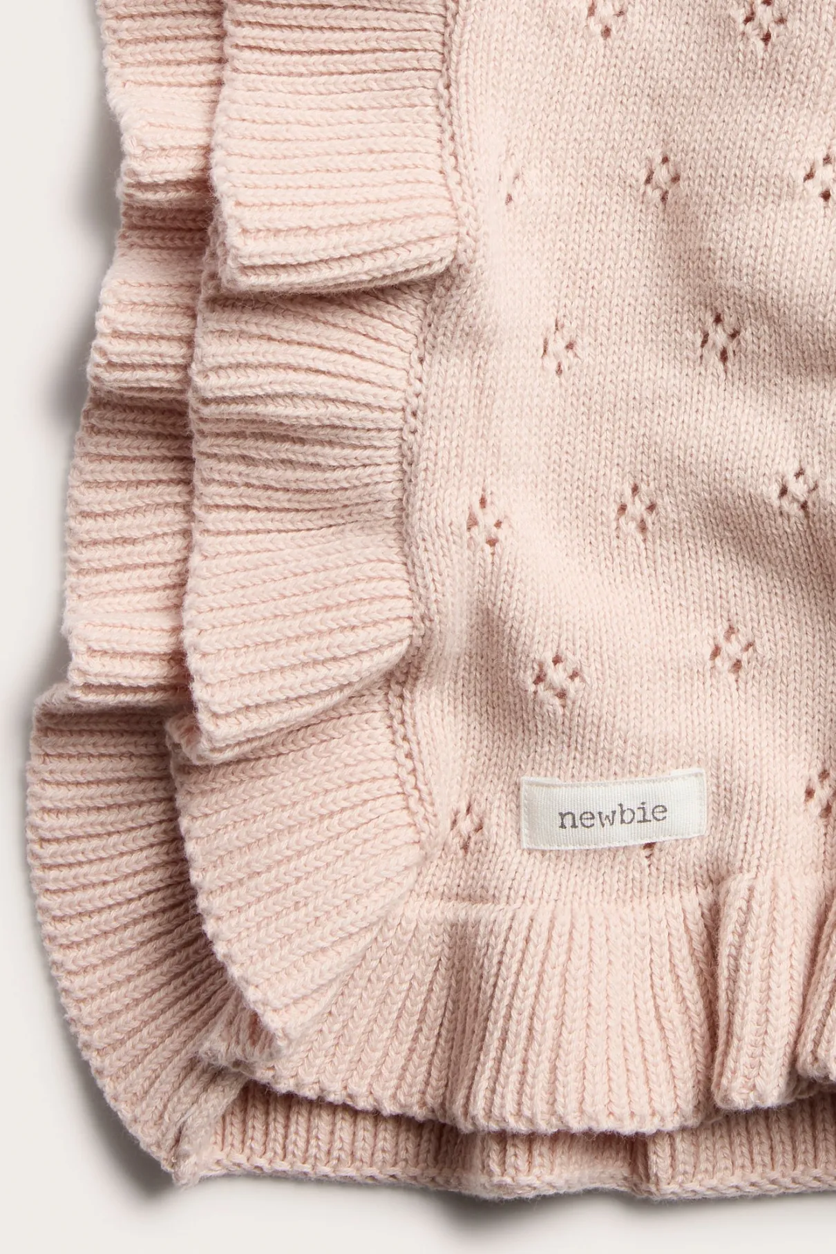 Baby pink knitted blanket