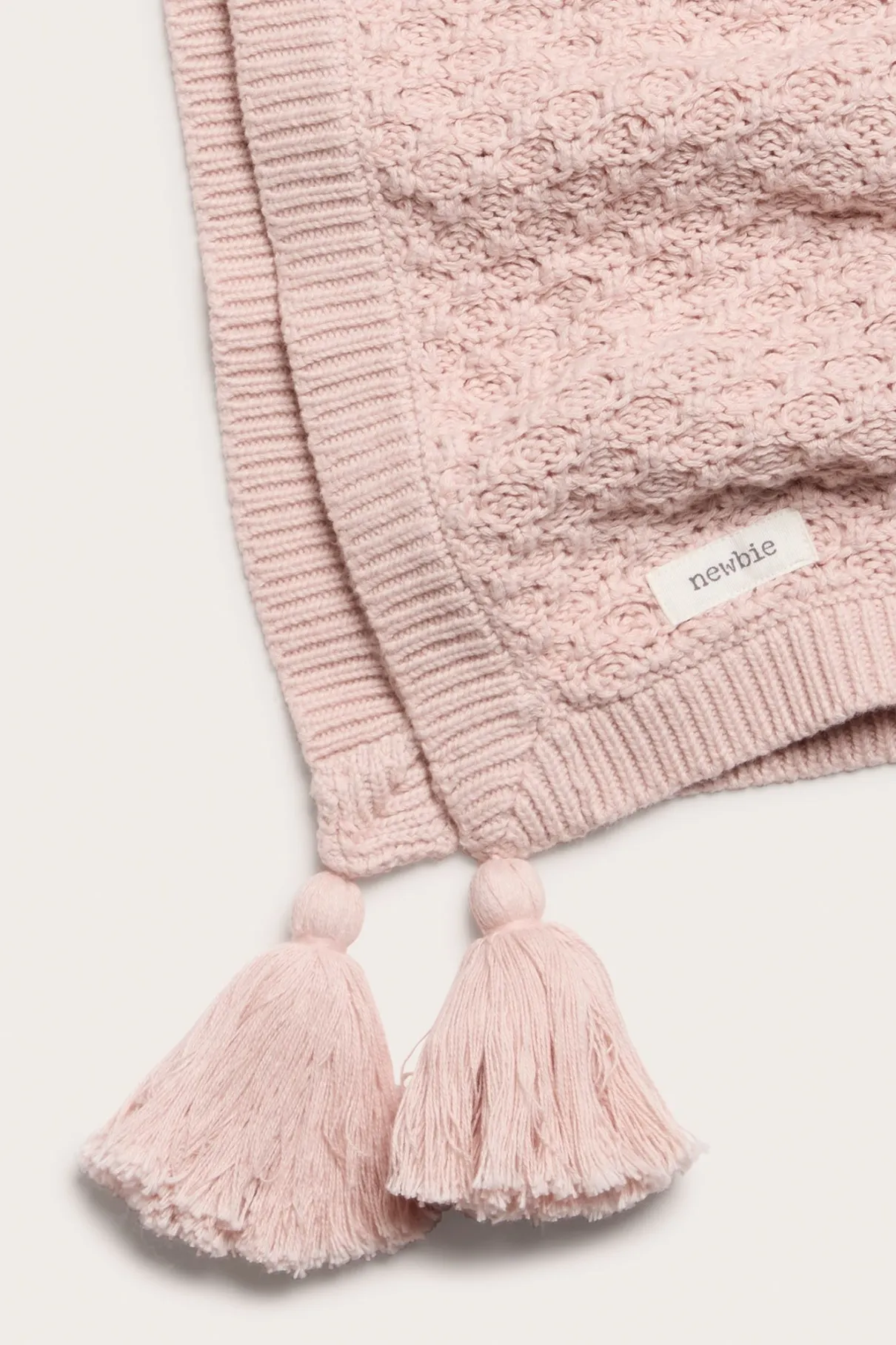 Baby pink knitted pattern blanket