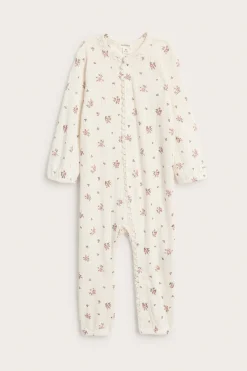Baby pyjamas with rose pattern