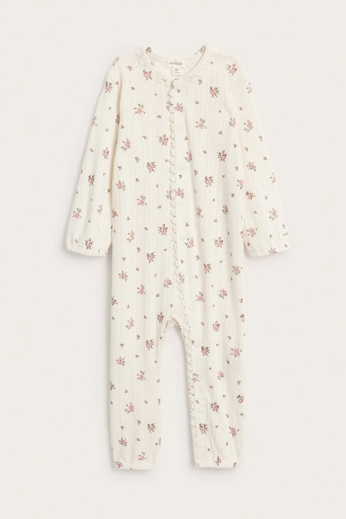 Baby pyjamas with rose pattern