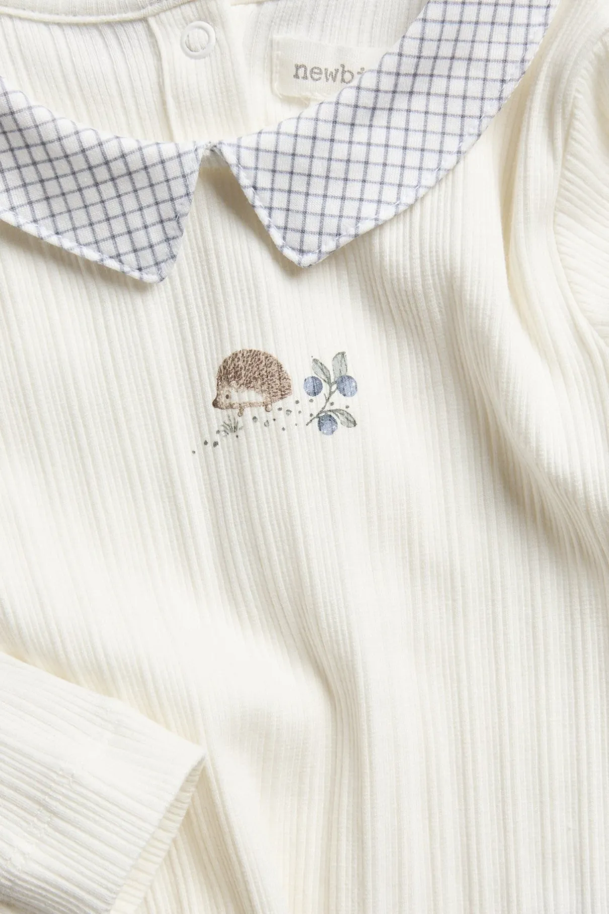 Baby white bodysuit with hedgehog print