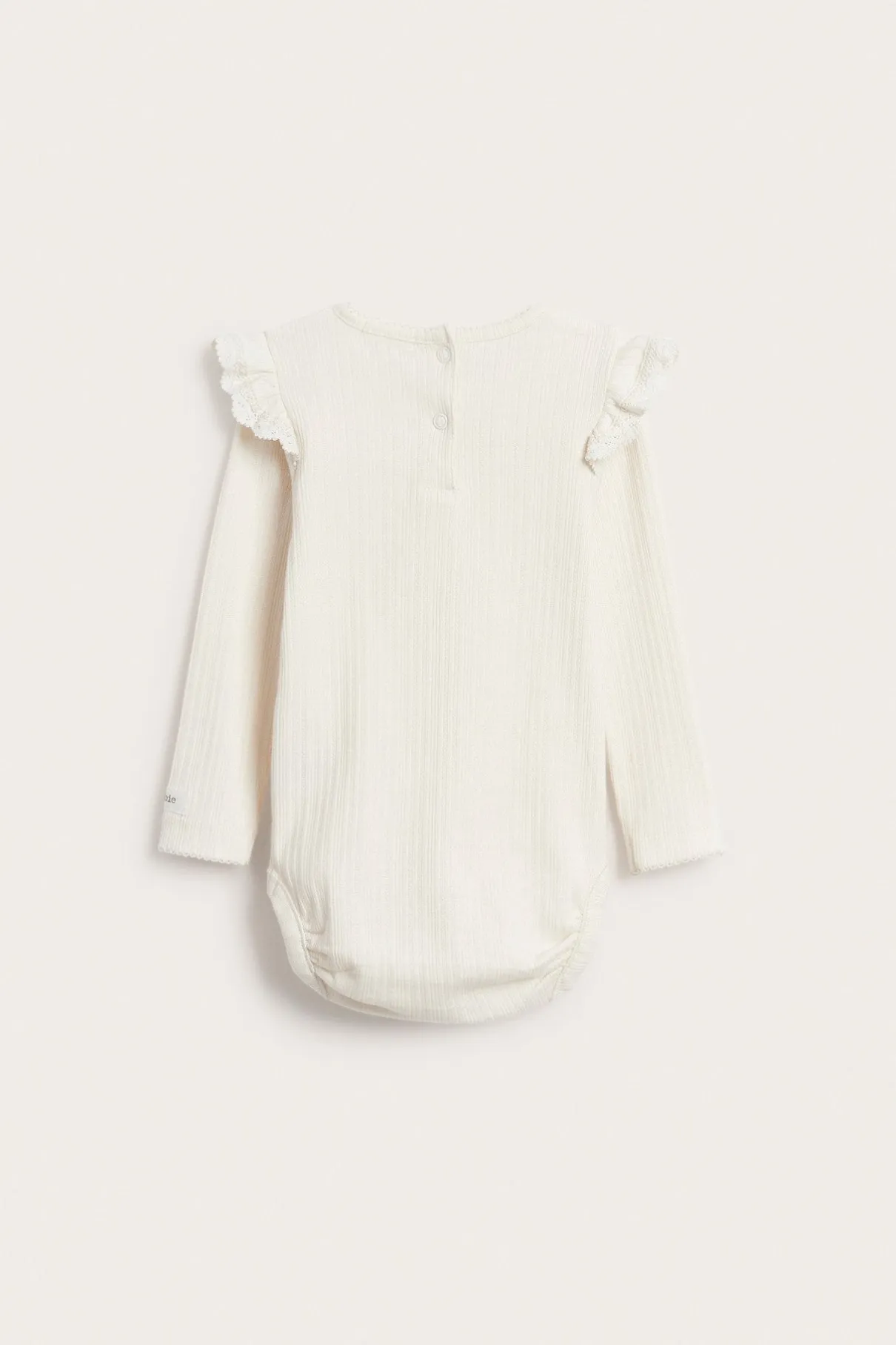 Baby white bodysuit with ruffles