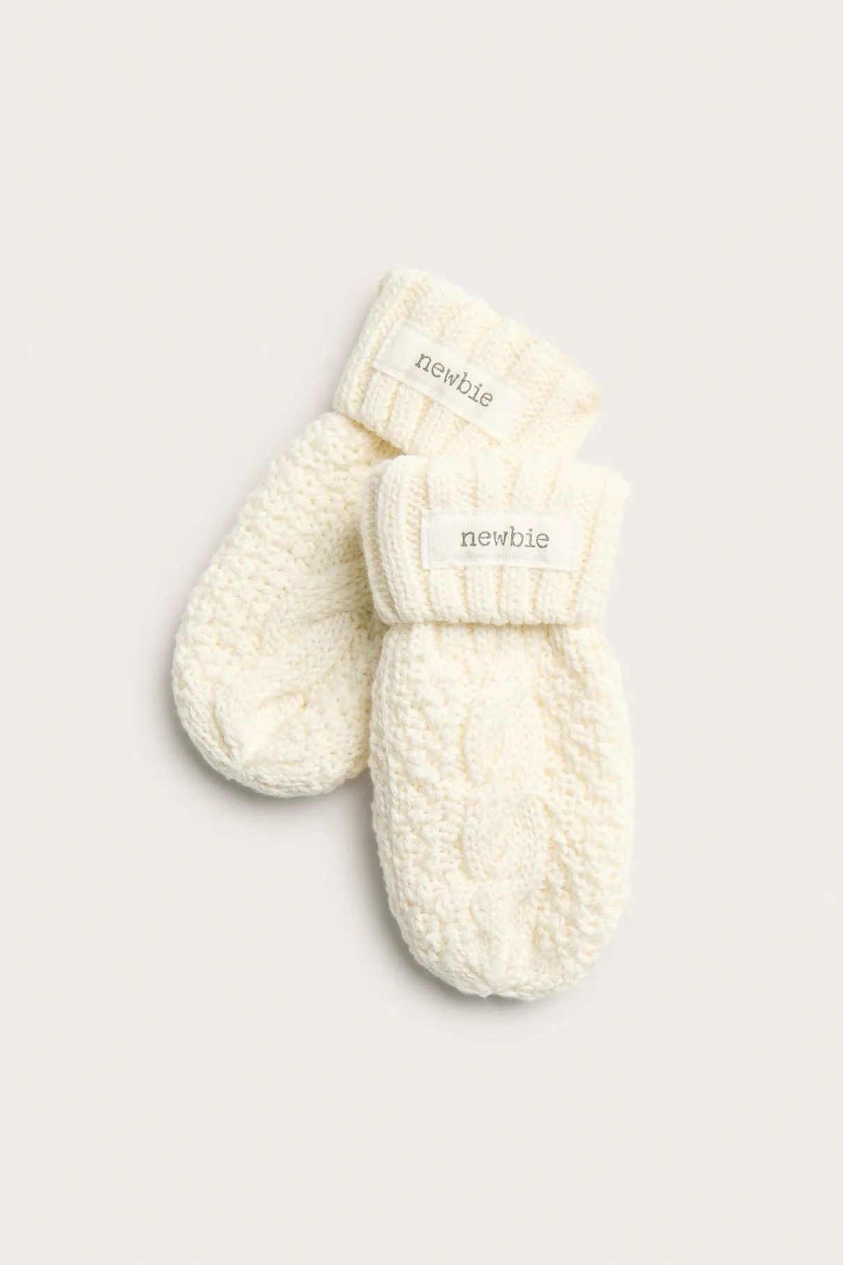 Baby white cable-knit mittens