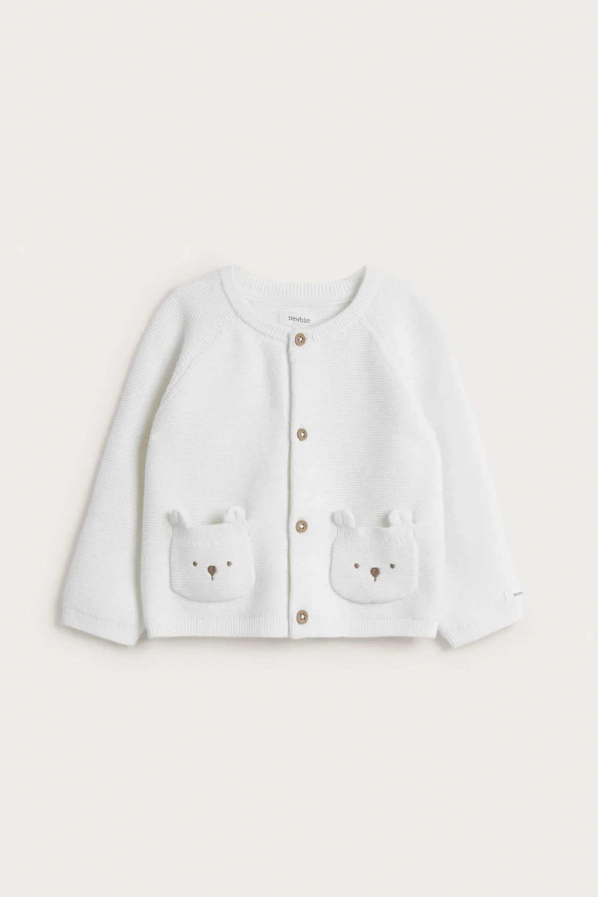 Baby white cardigan with cute pockets
