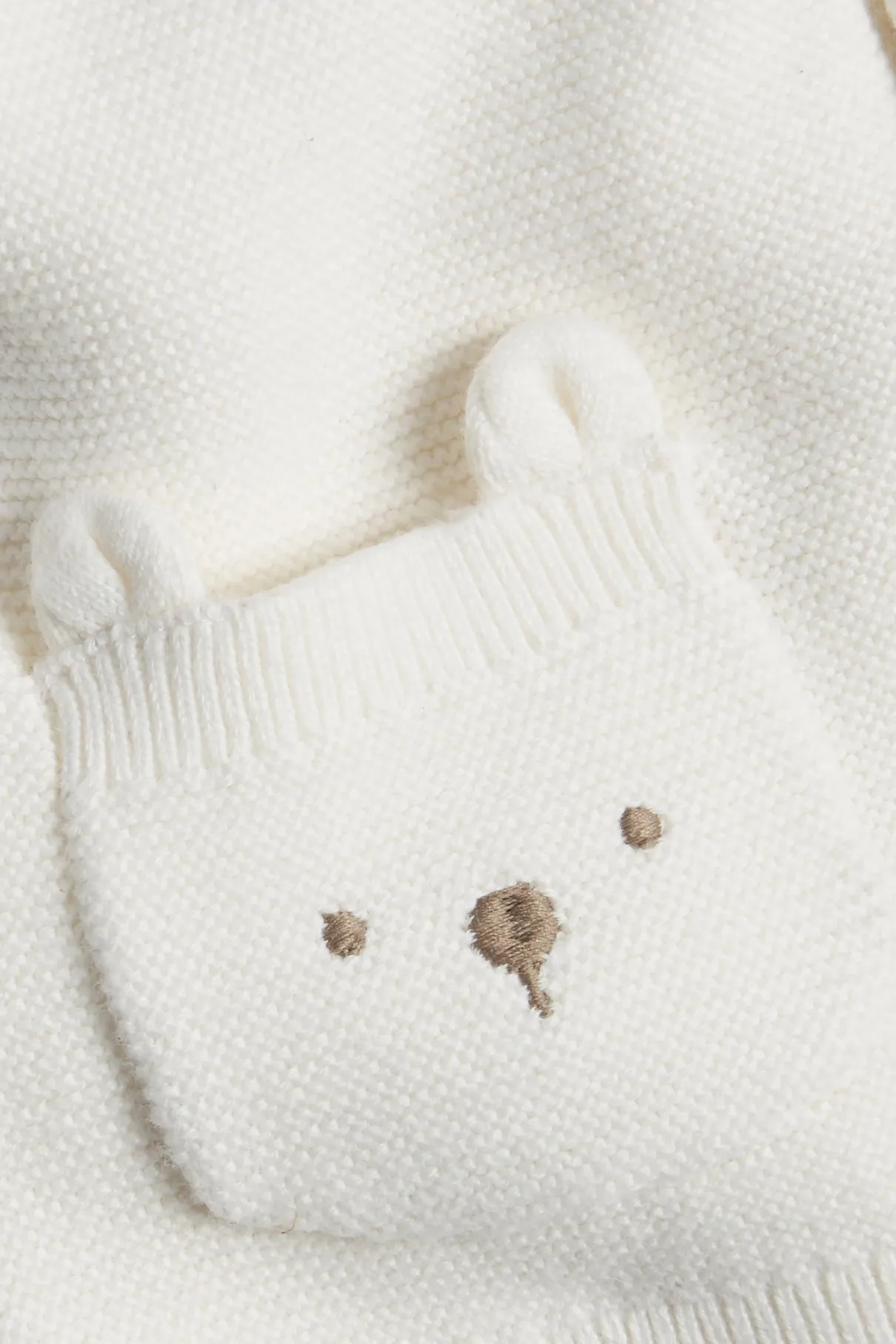 Baby white cardigan with cute pockets