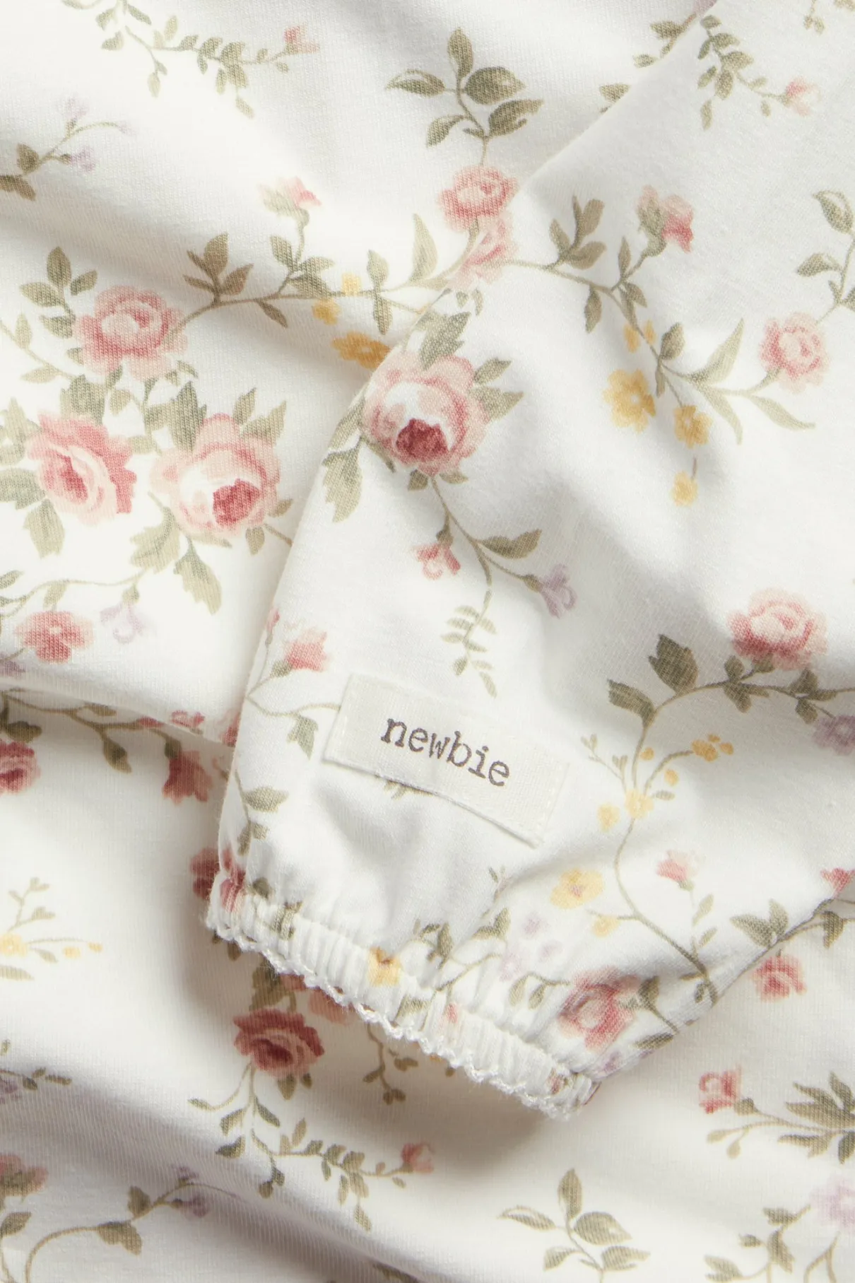 Baby white floral long-sleeve bodysuit