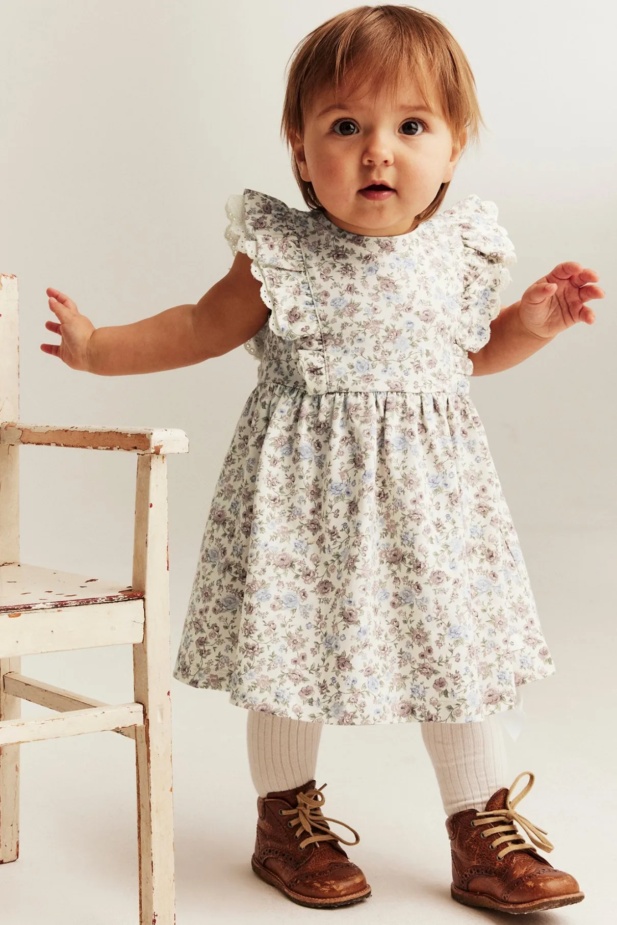 Baby white floral sleeveless dress with lace